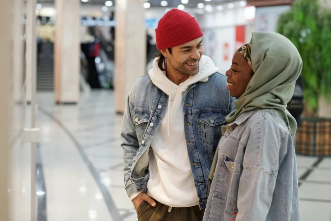 how to date a foreign woman - a couple standing inside a mall